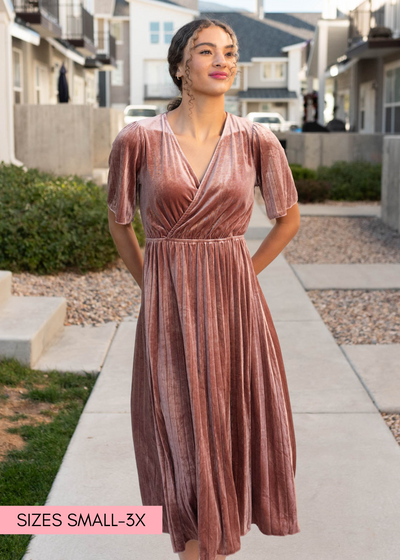 Front view of the dusty rose velvet dress