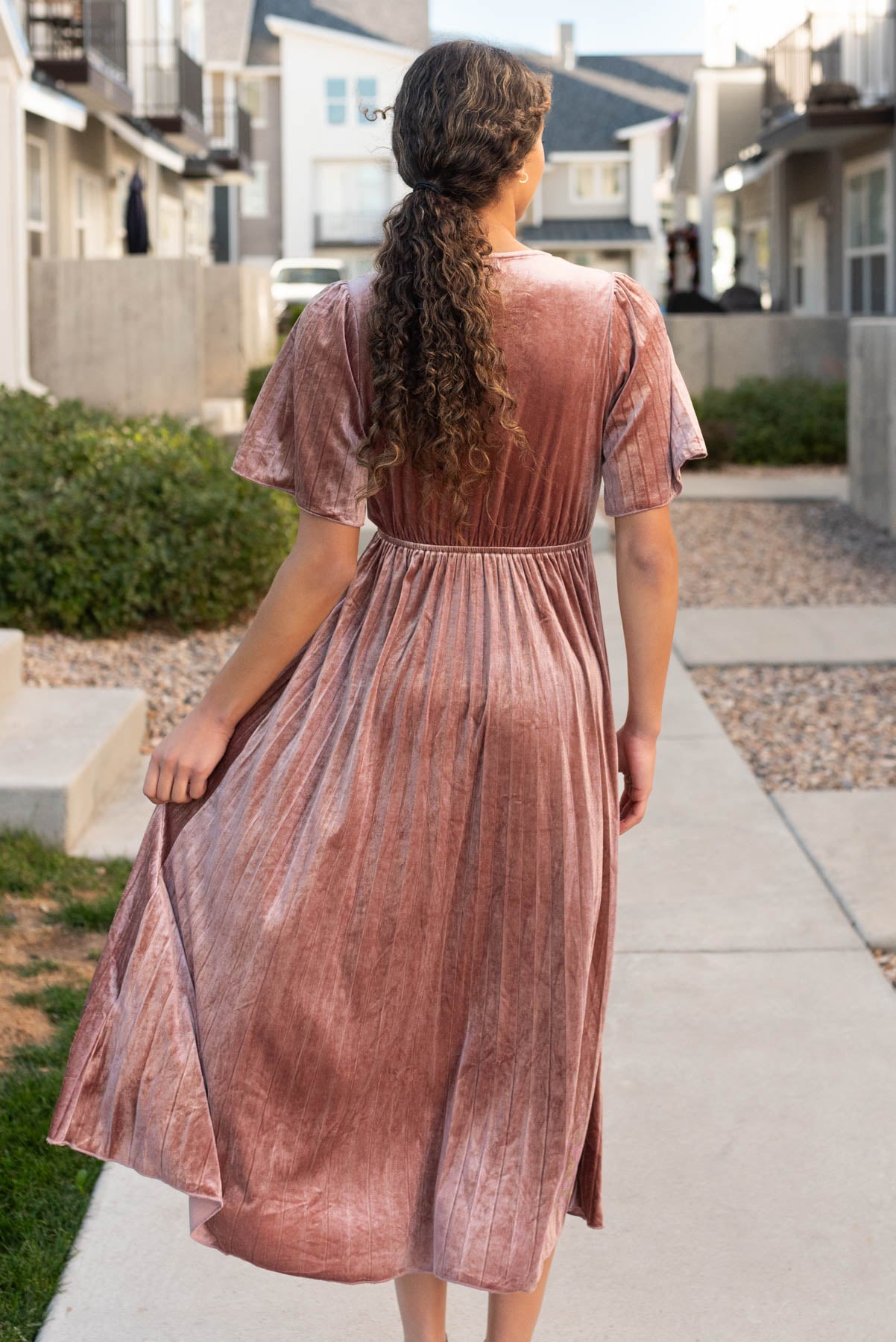 Back view of the dusty rose velvet dress