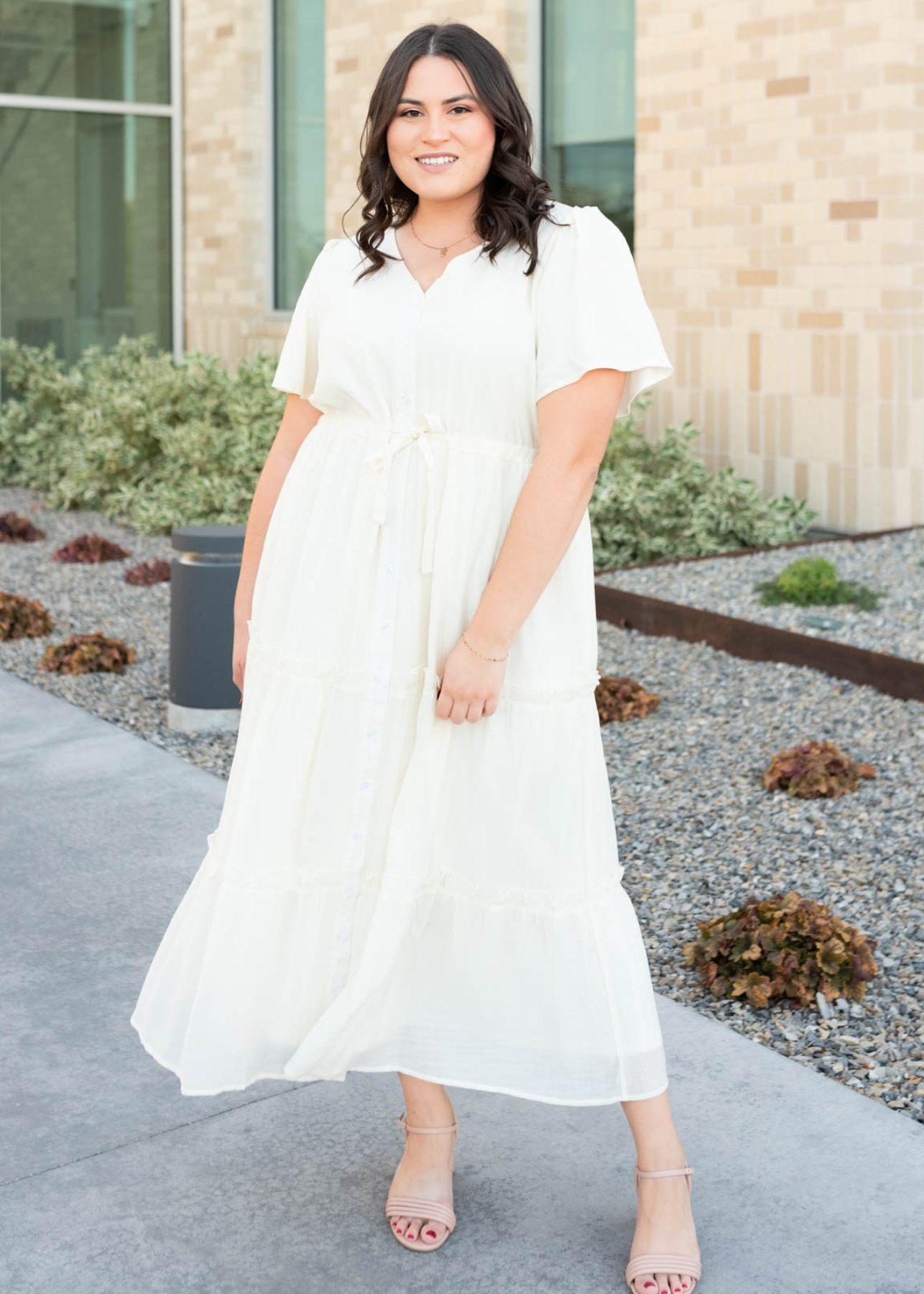 Plus size cream button down dress with tiered skirt