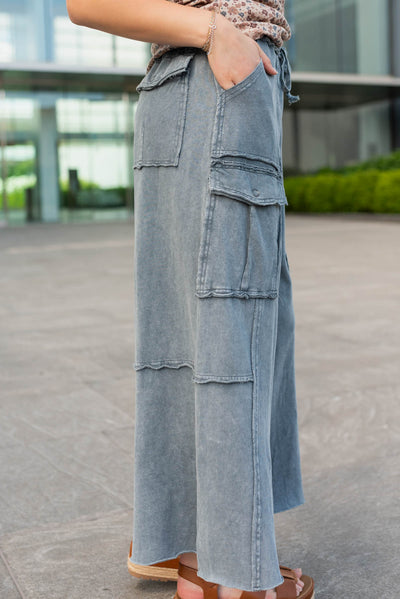 Side view of the faded blue wide leg pants