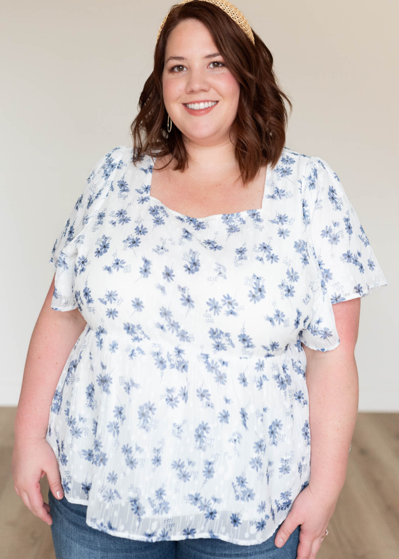 Plus size blue floral blouse with short sleeves