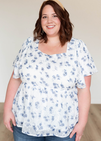 Plus size blue floral blouse with short sleeves