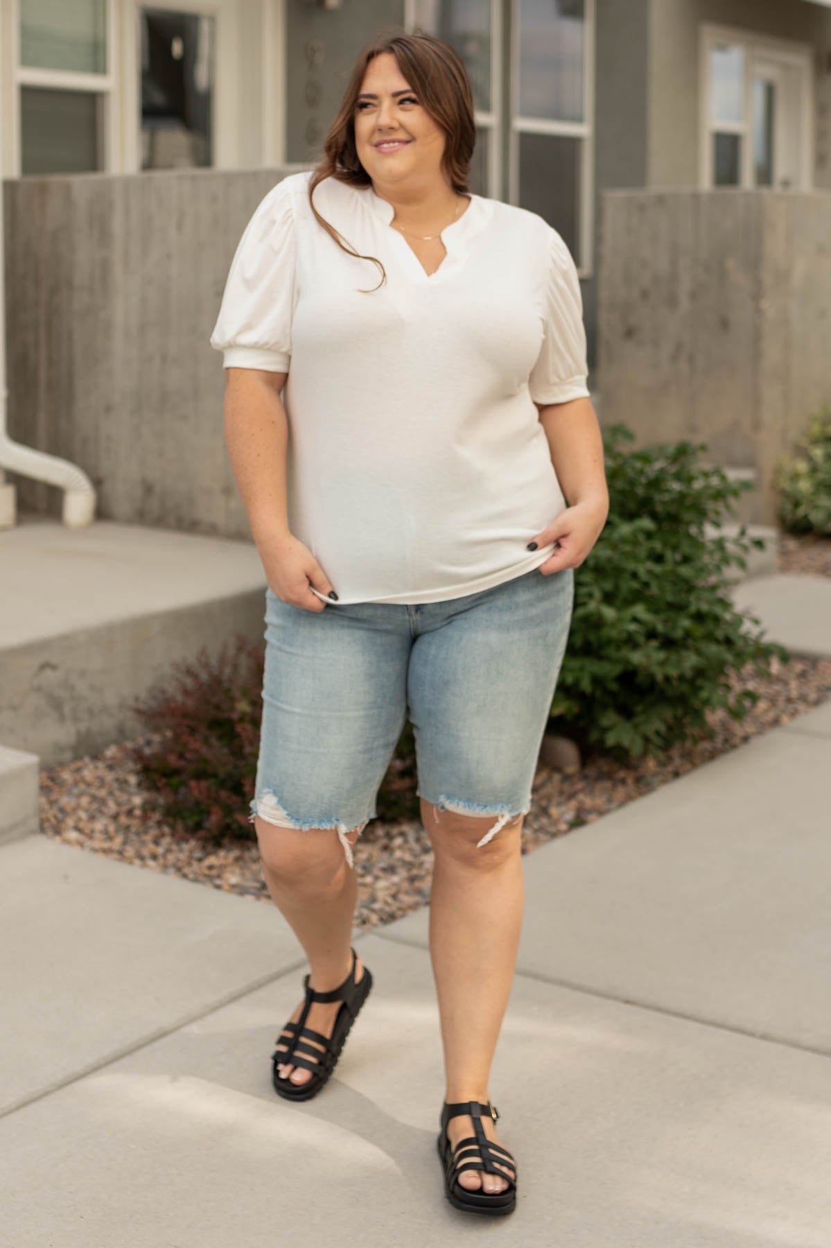 Plus size Rosa white top with cuffs on the short sleeves and v-neck opening at the neck