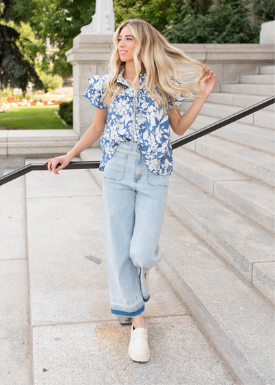 Short sleeve blue floral ruffle top