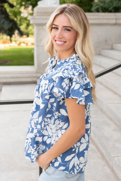 Side  view of the blue floral ruffle top