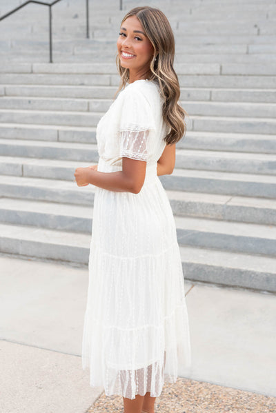 Side view of the cream lace dress