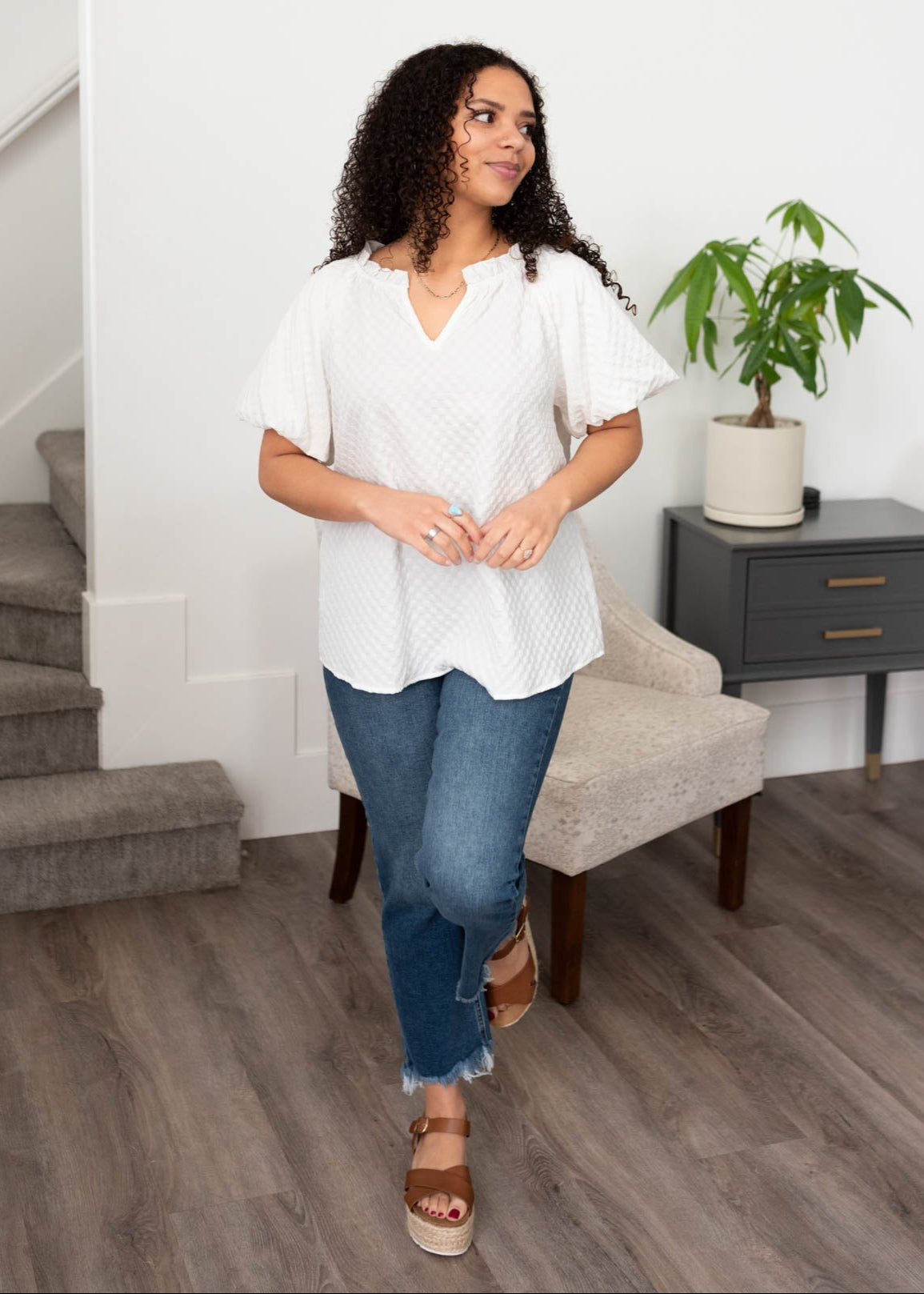 White textured top with v cut in the neck