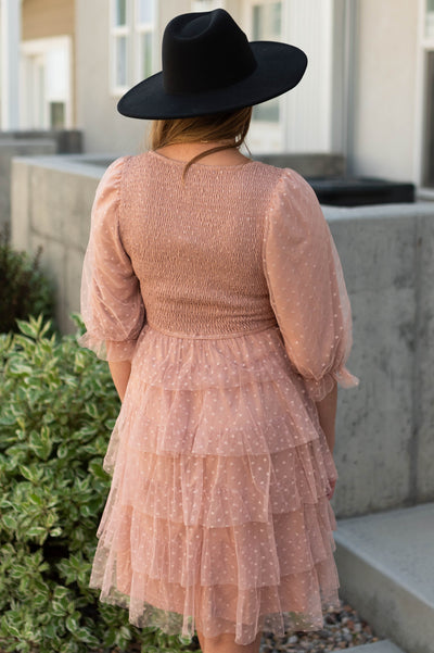 Back view of a nude dress