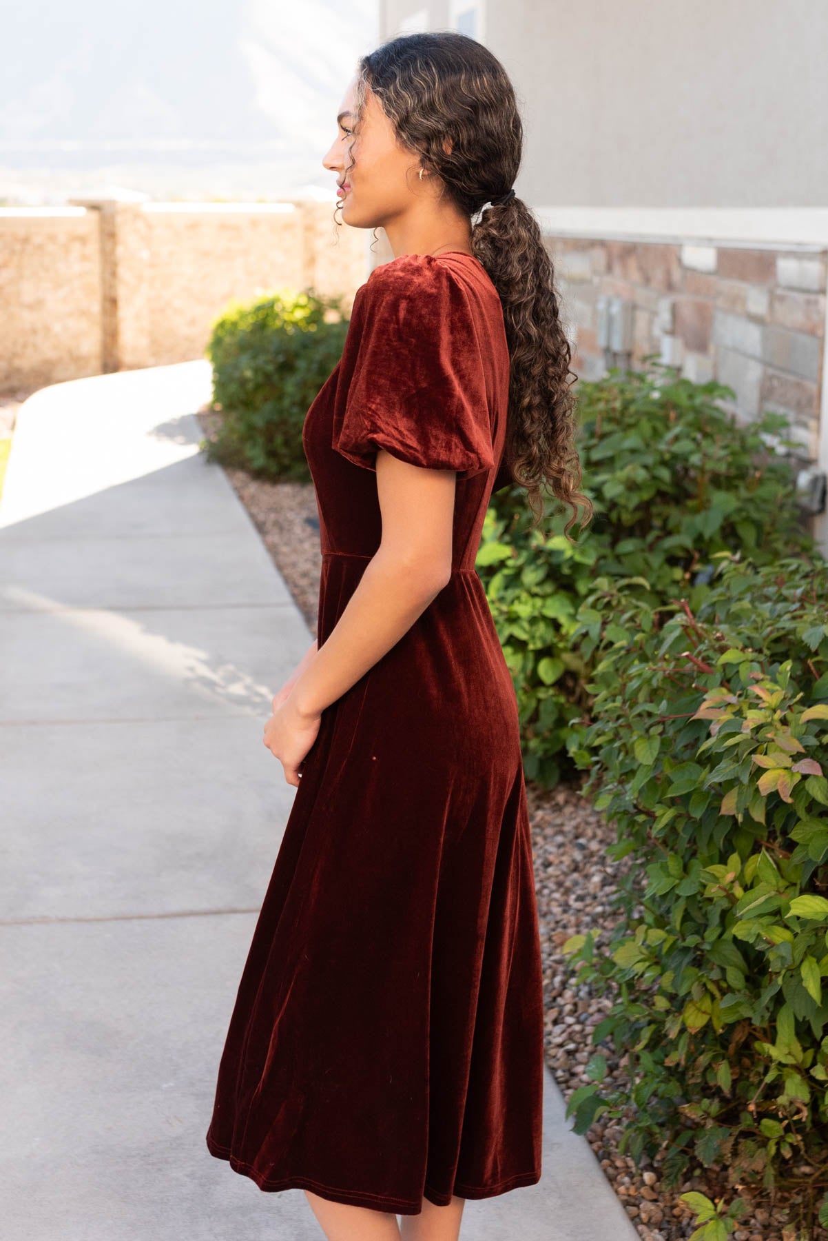 Side view of the copper velvet dress