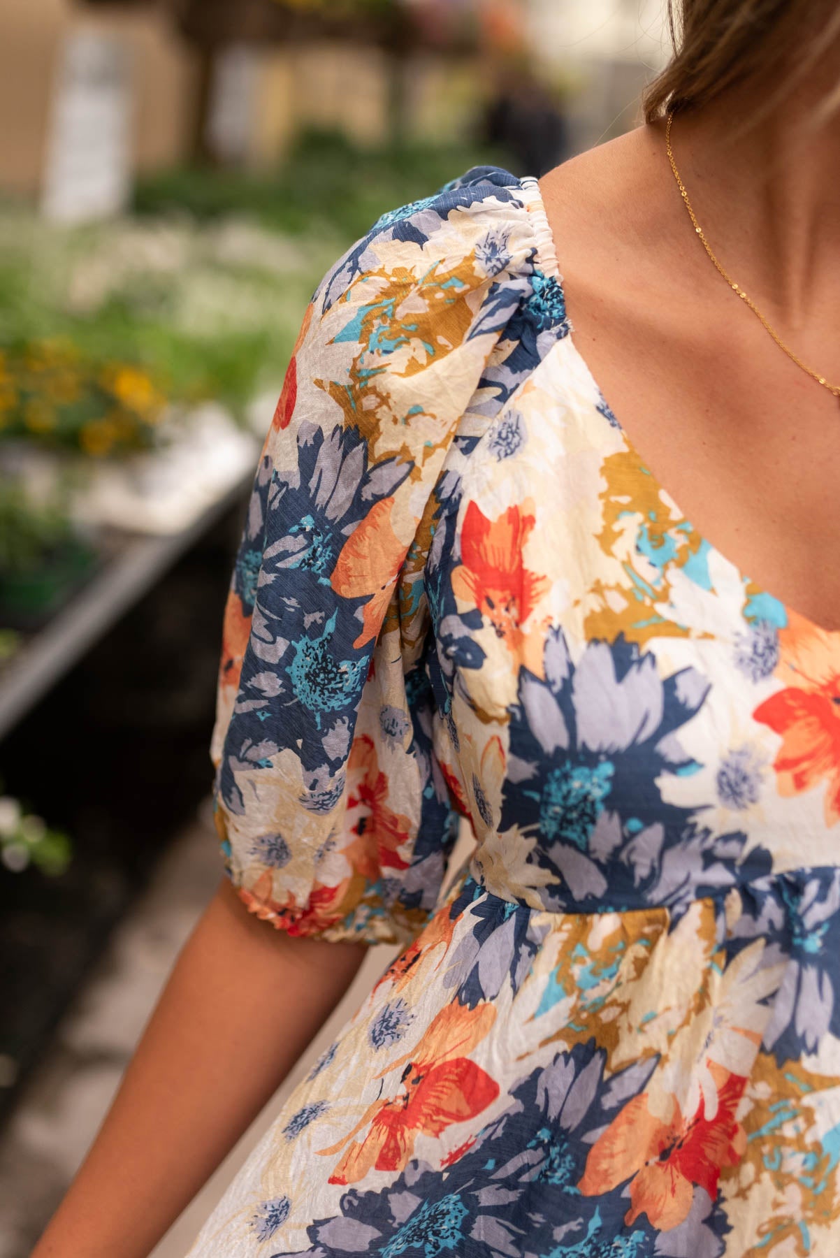 Close up of the fabric on the navy floral dress