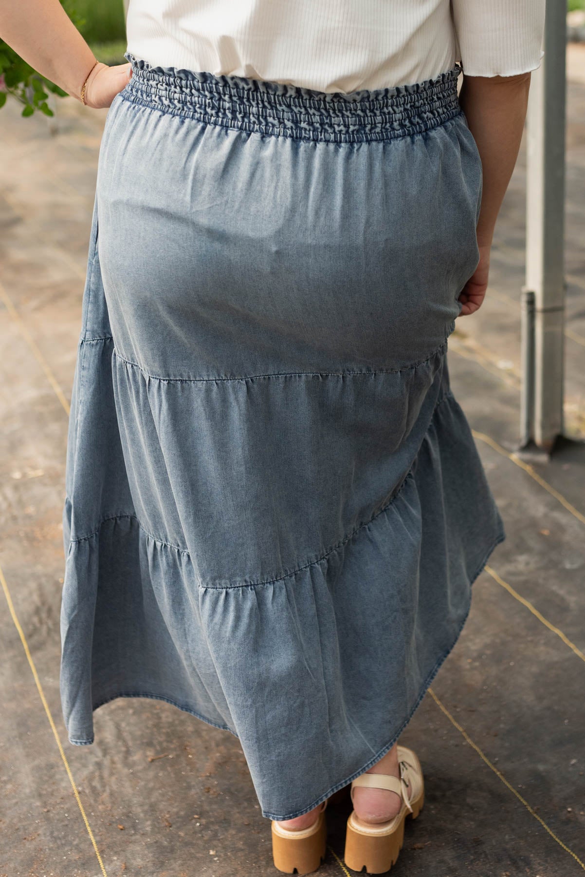 Back view of the denim blue tiered skirt