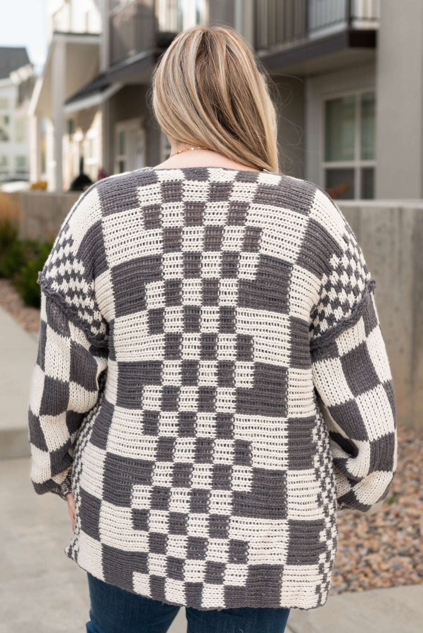 Back view of the plus size charcoal cardigan