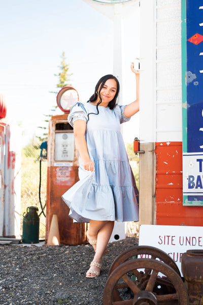 Short sleeve with a ruffle stone blue dress with tiered skirt