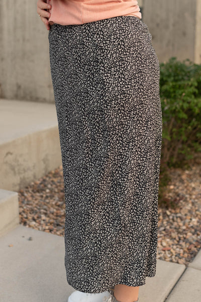 Side view of the black floral skirt