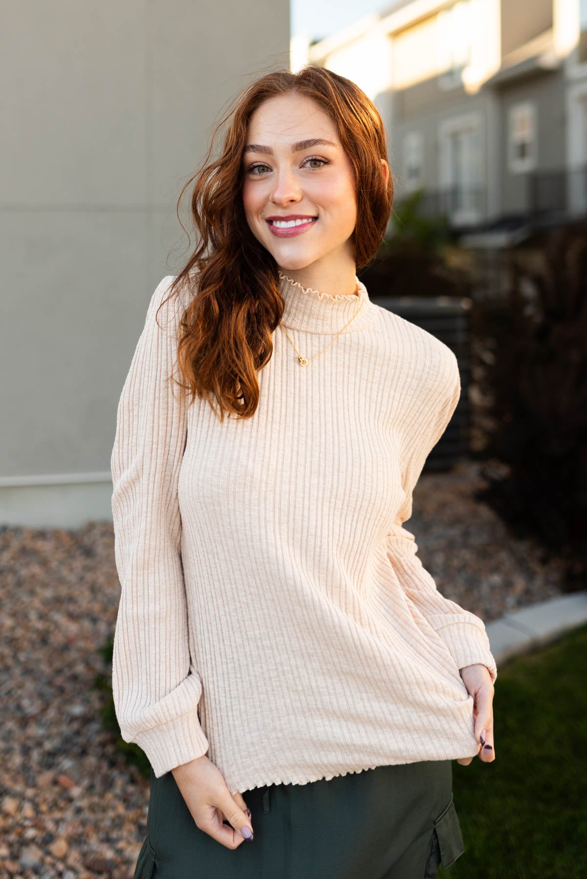 Cream top with long sleeves