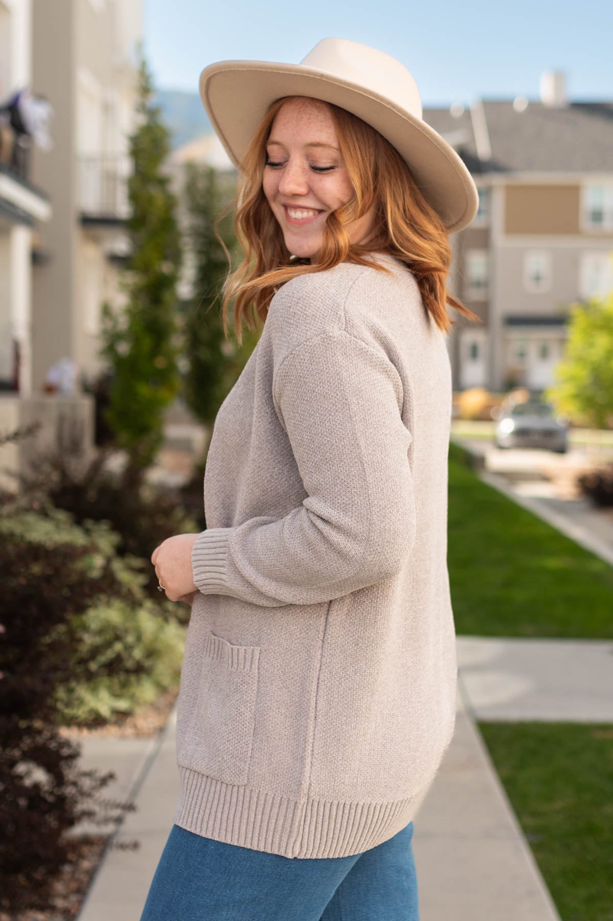 Side view of a light mocha cardigan