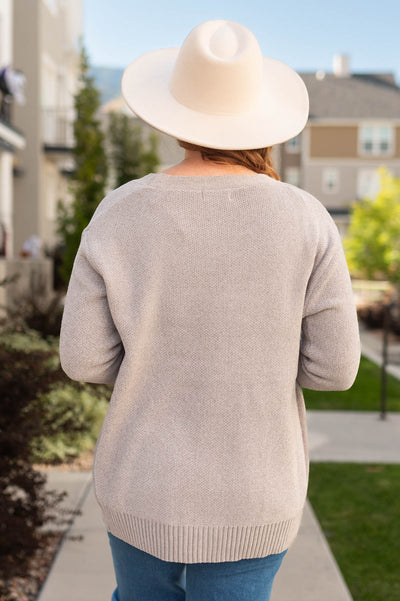 Back view of a light mocha cardigan