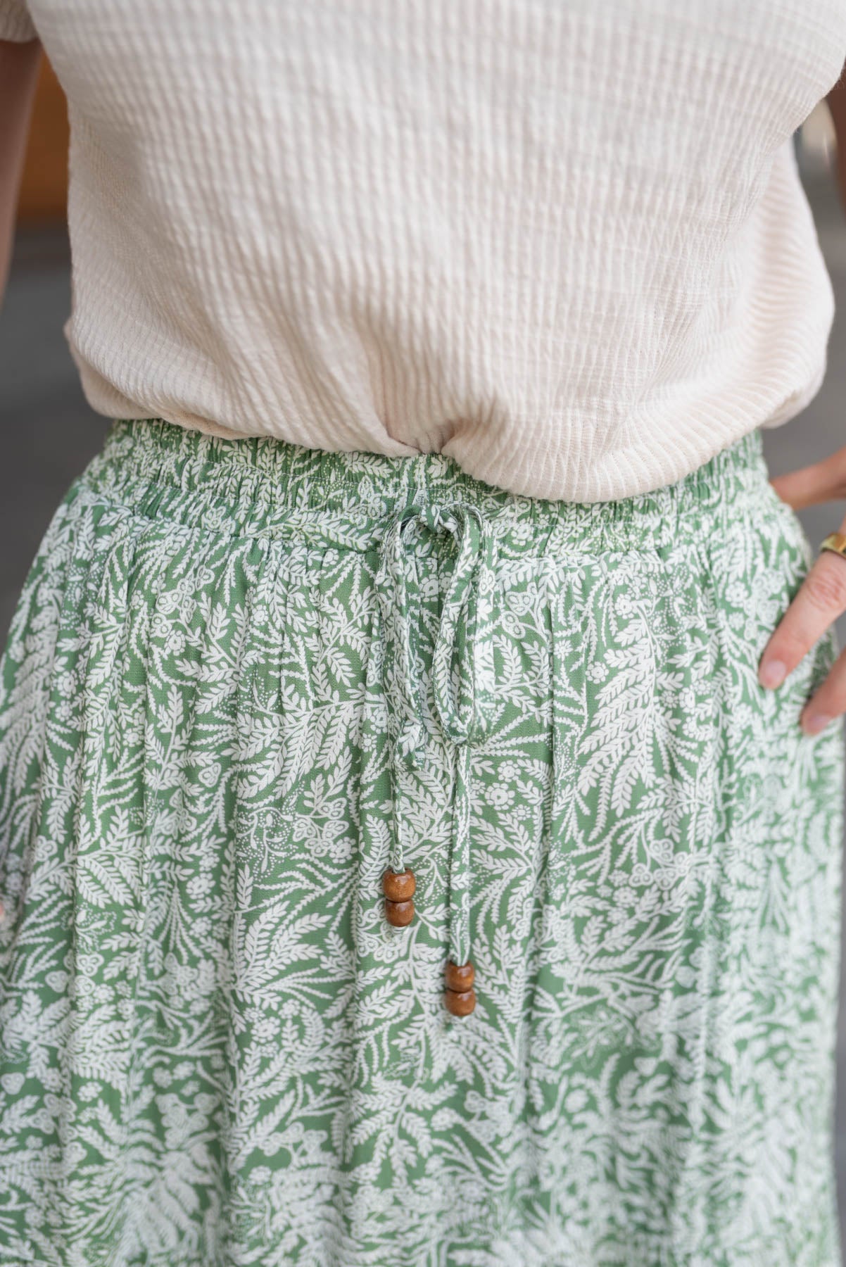 Close up of the green leaf skirt