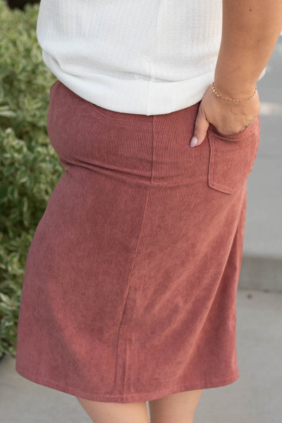 Side view of the plus size dusty rose corduroy skirt