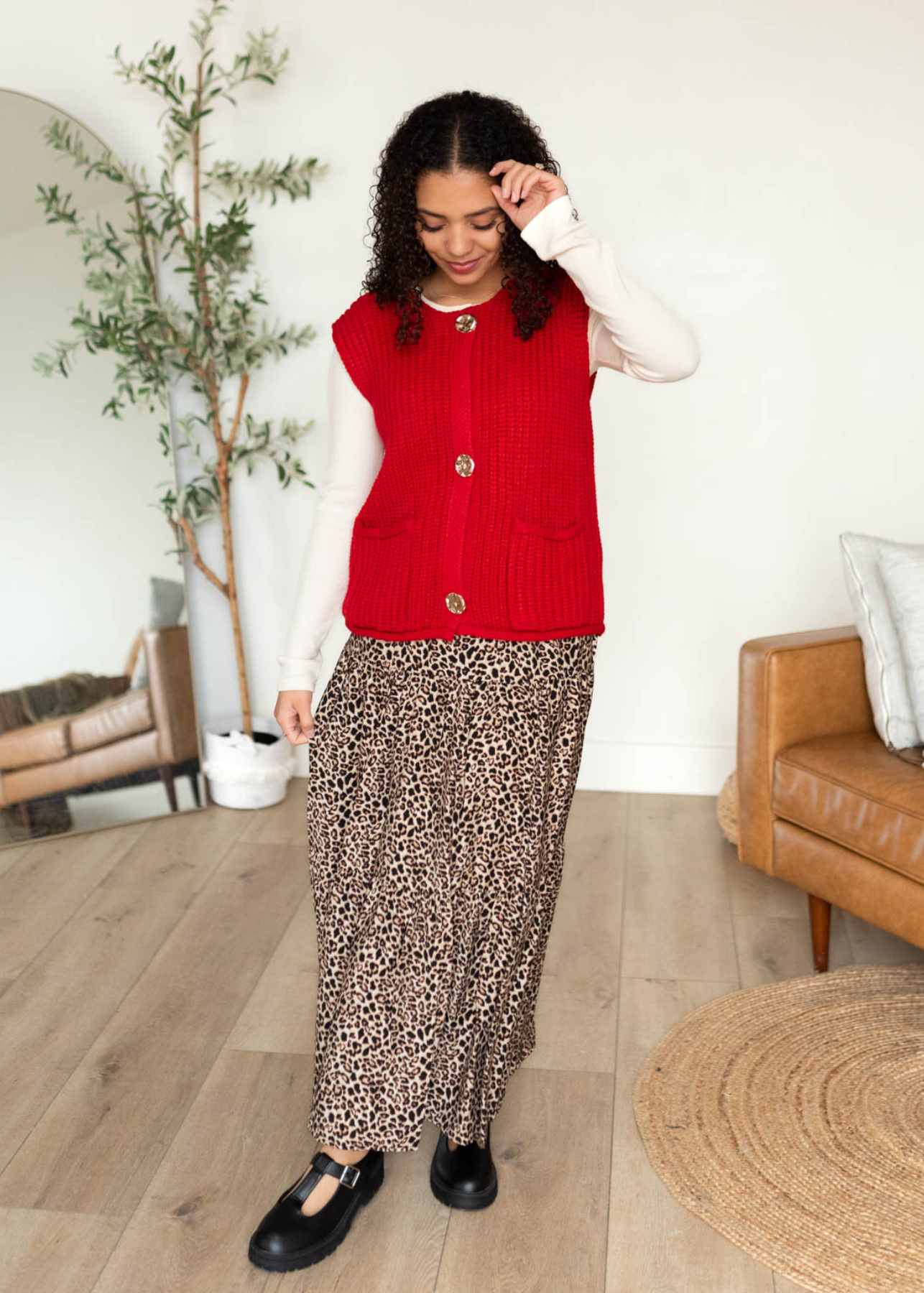 Red knit sweater vest with pockets