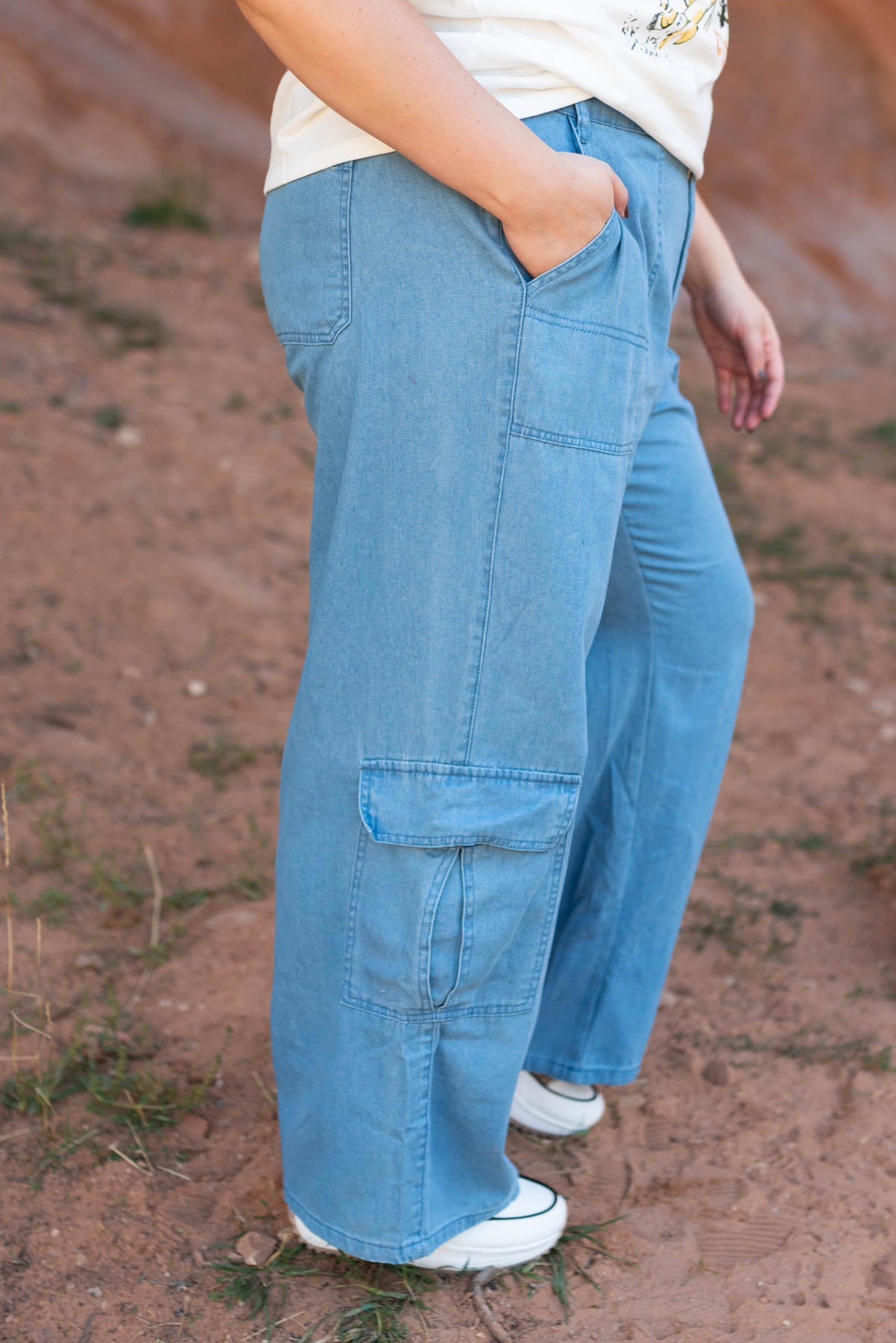 Side view of denim pants with side pockets