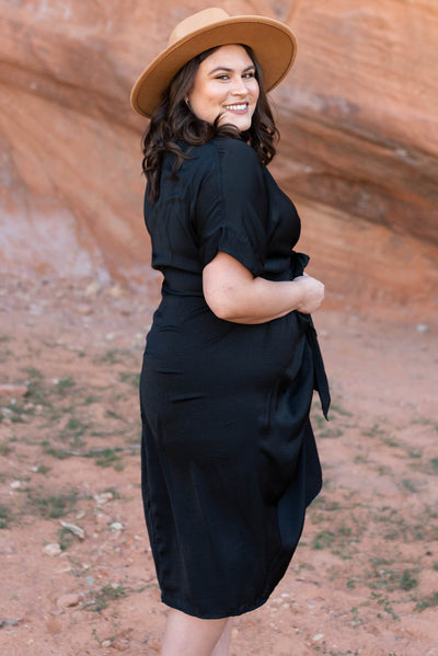 Side view of a plus size black dress