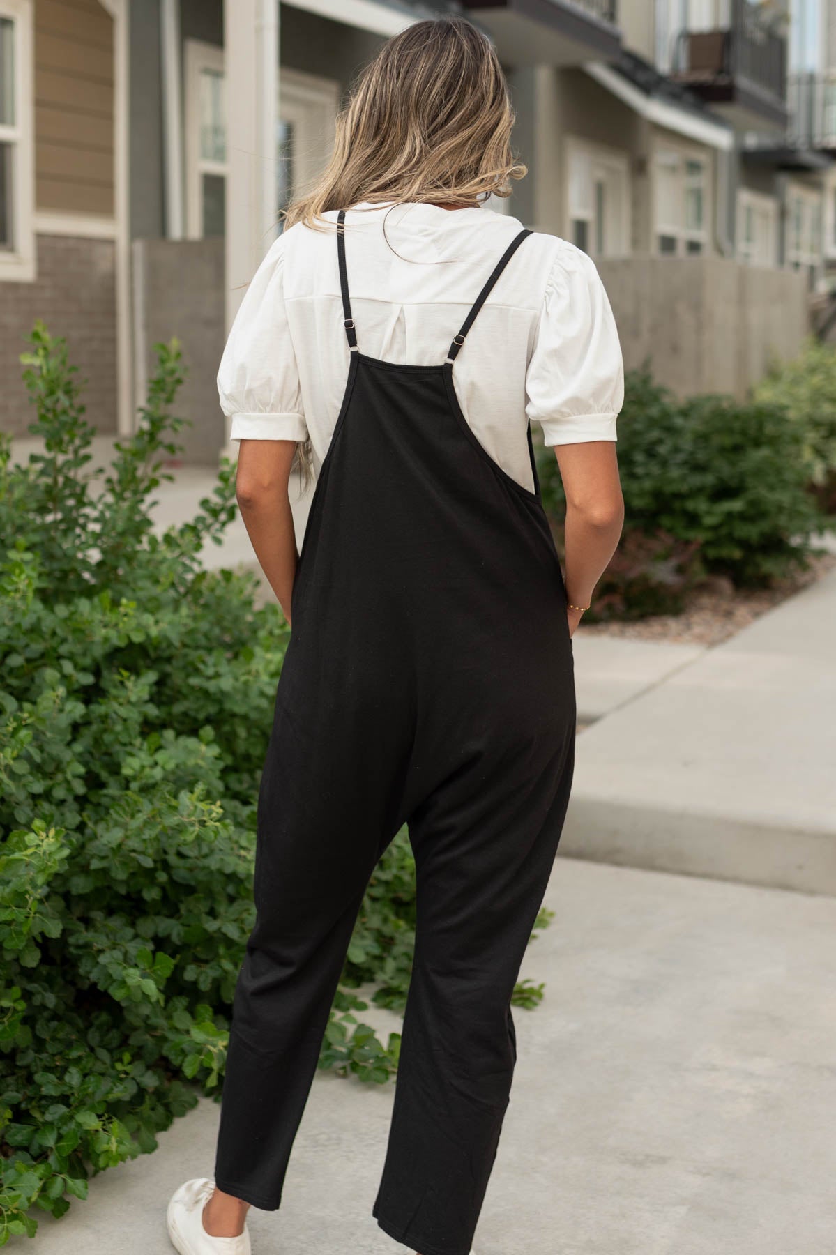 Back view of a black jumpsuit