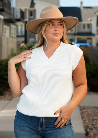 Front view of a white sweater vest