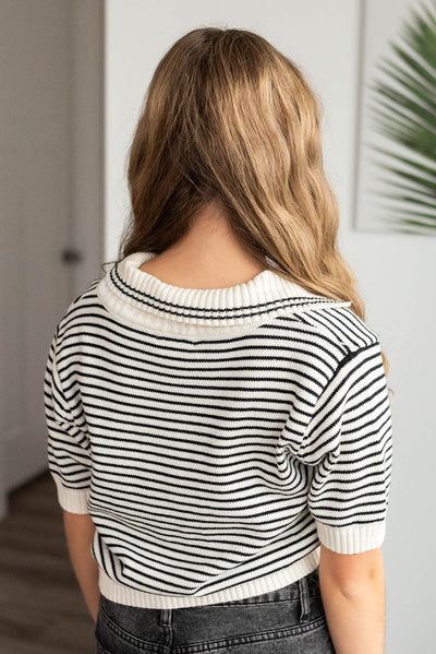 Back view of the black stripe collared sweater