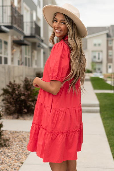 Side view of a short sleeve red dress