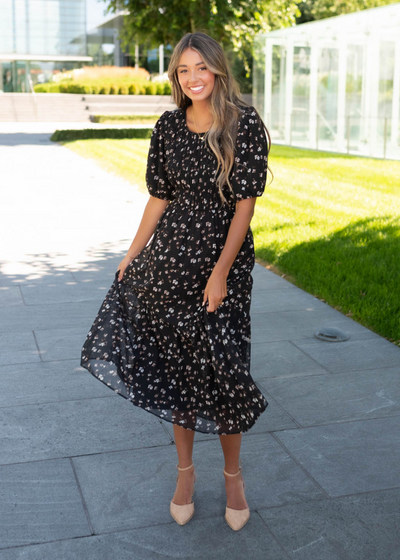 Black floral smocked dress with short sleeves