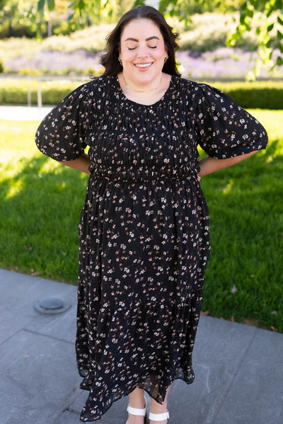 Black floral smocked dress with tiered skirt