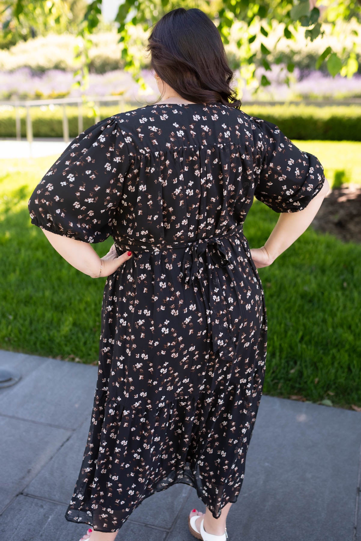 Back view of the black floral smocked dress