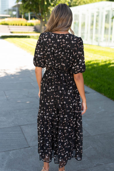 Back view of the black floral smocked dress