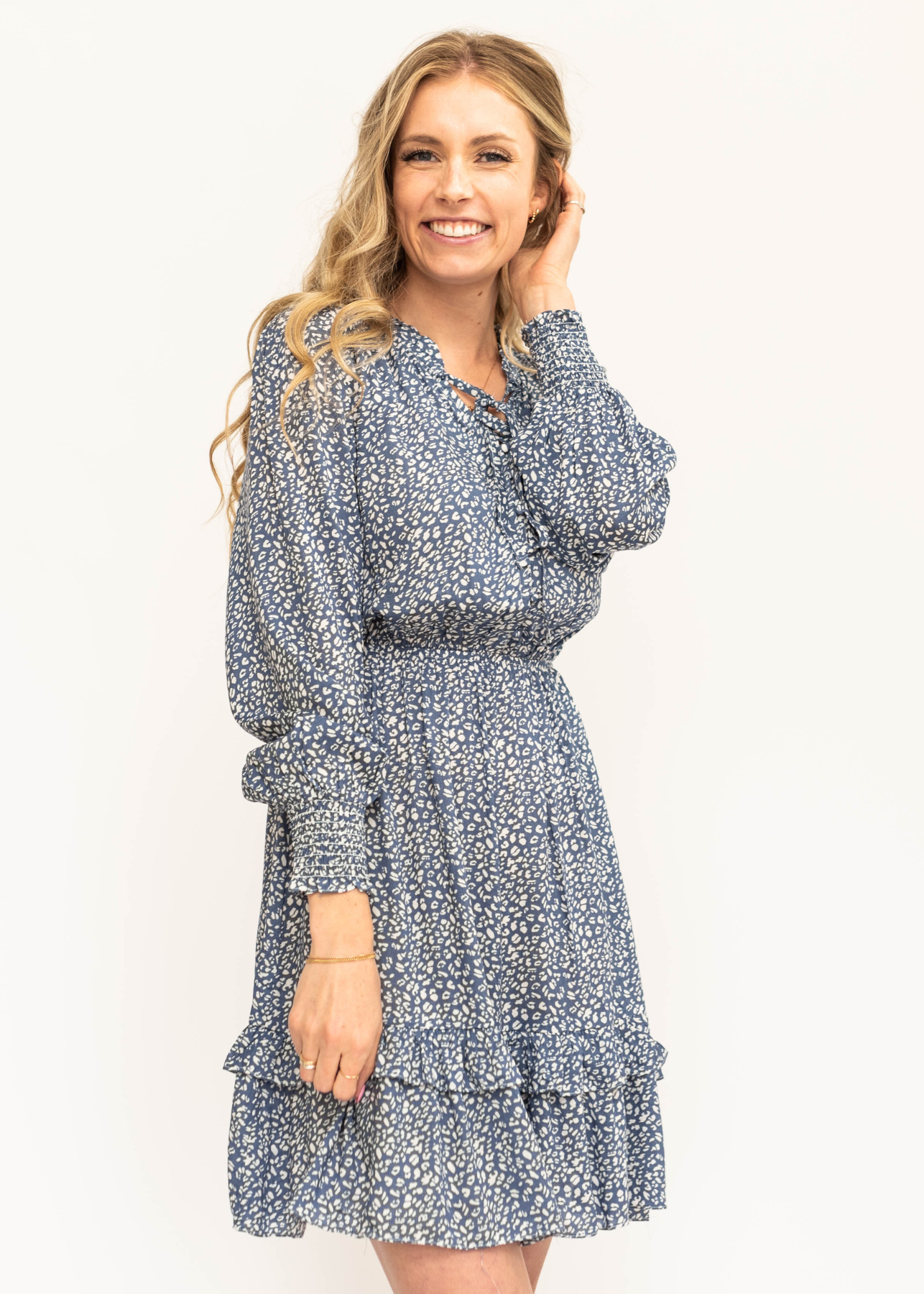 Long sleeve, elastic waist navy leopard dress.