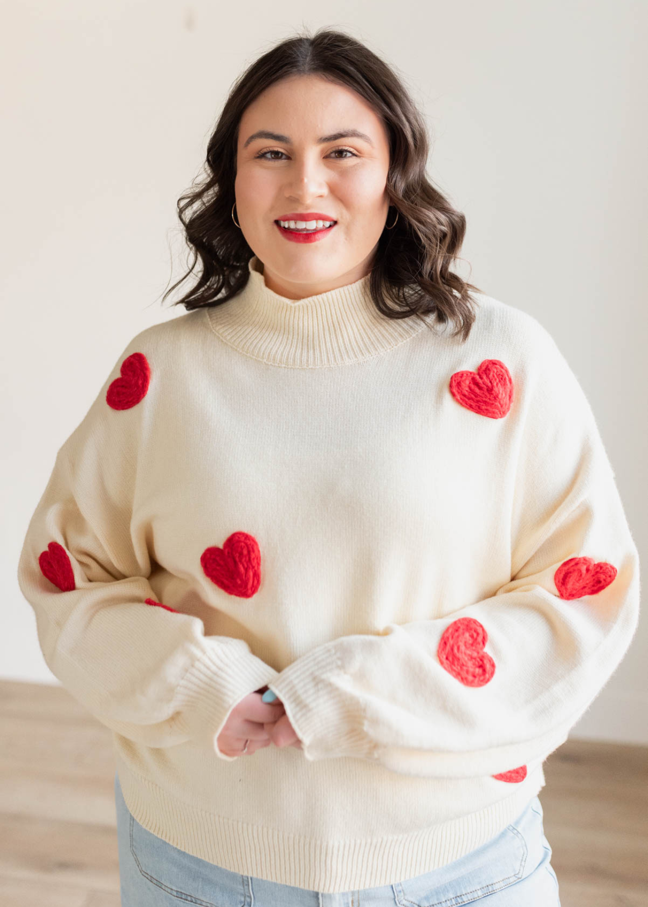 Plus size red heart cream sweater