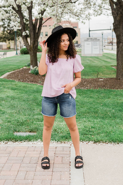 Cheerful Mid Rise Distressed Midi Shorts