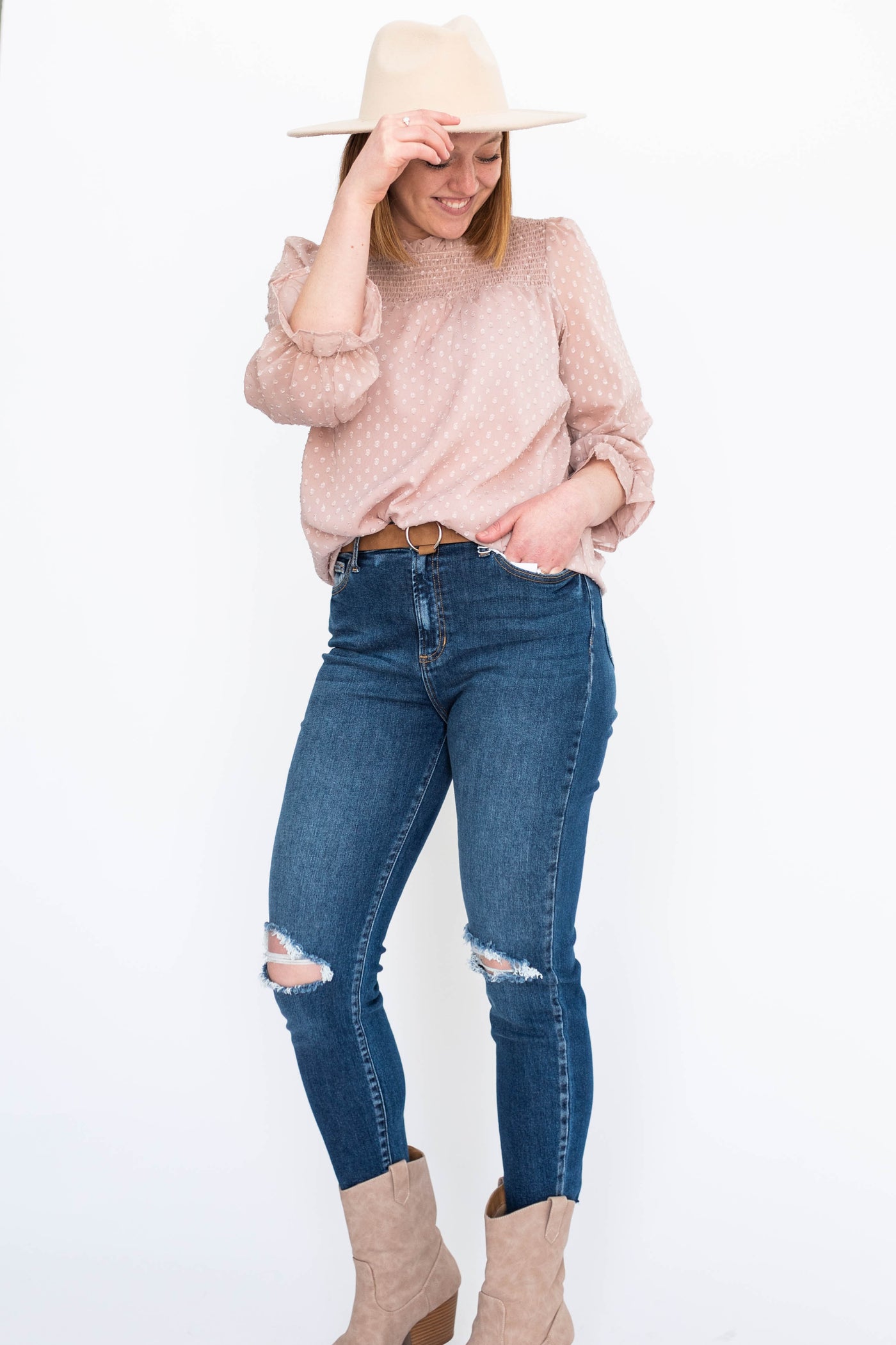 Dusty pink top with smocking around the neck