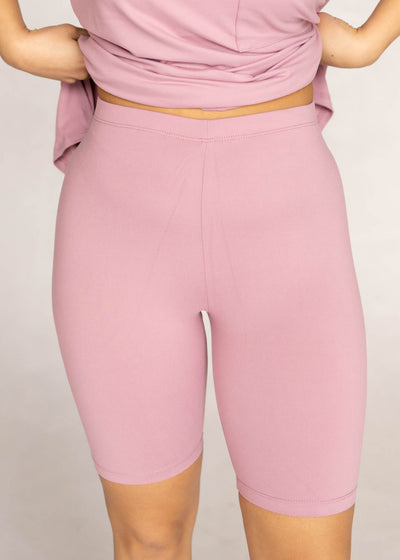 Front view of biker shorts of a light rose set